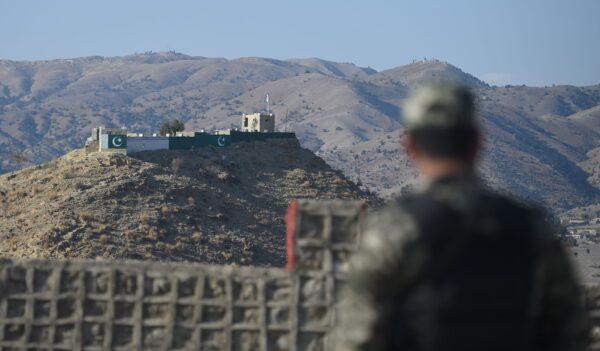 A Pakistani army soldier stands guard on a border terminal in Ghulam Khan, a town in North Waziristan, on the border between Pakistan and Afghanistan on Jan. 27, 2019. (Farooq Naeem/AFP via Getty Images)
