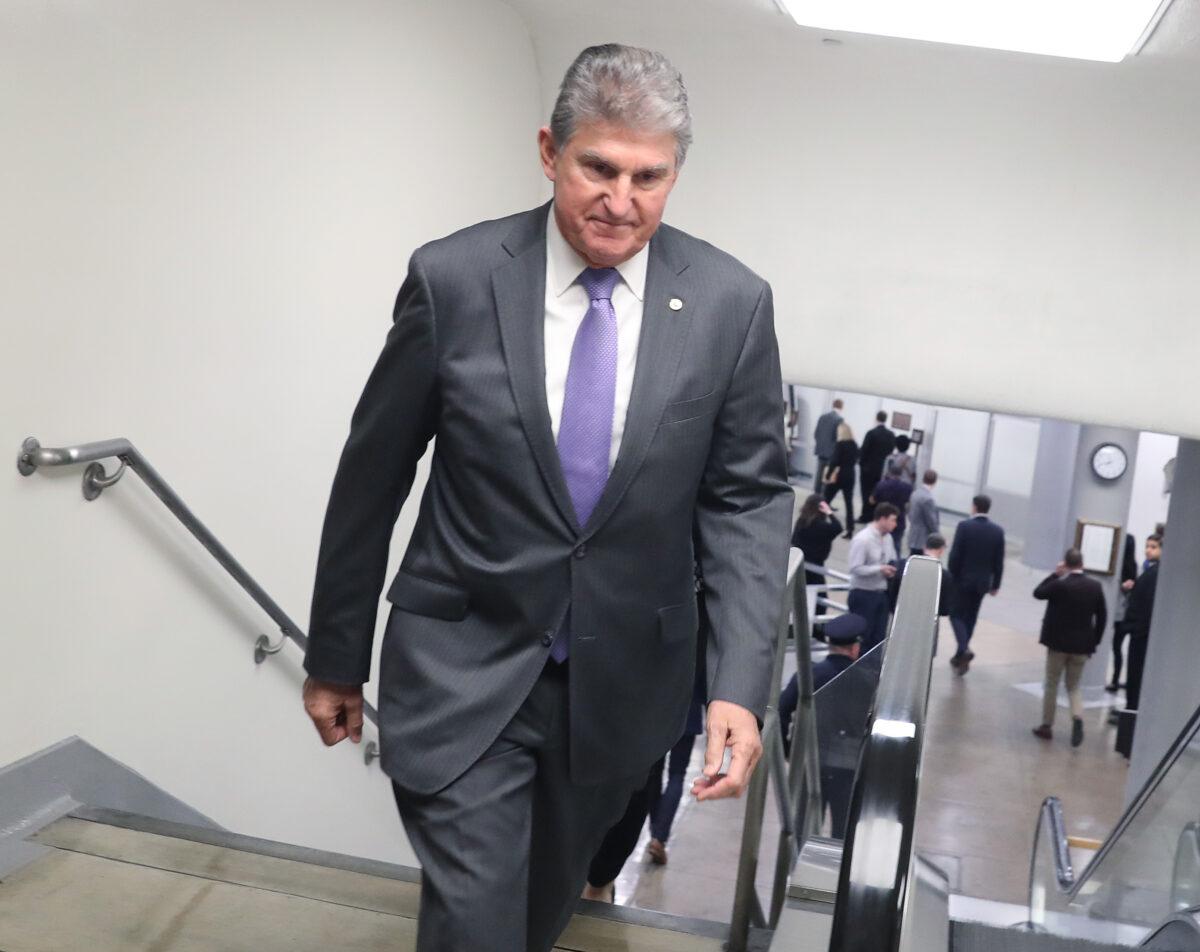 Sen. Joe Manchin (D-W.Va.) walks to the Senate Chamber at the U.S. Capitol in Washington on Jan. 21, 2020. (Mark Wilson/Getty Images)