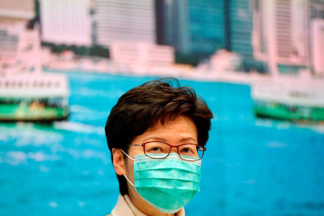 Hong Kong Leader Rejects Calls to Close Border Despite Virus Fears
