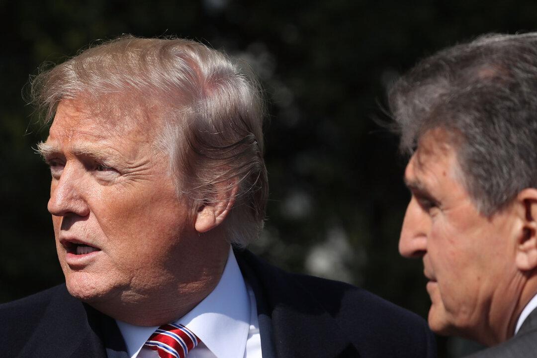 Trump Threatens to Campaign Against Sen. Manchin Over Inflation Bill