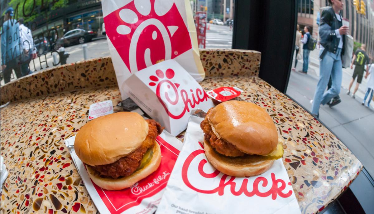 Chick-Fil-A Employee Sits Outside on the Median Strip With Homeless Man, Sharing a Meal