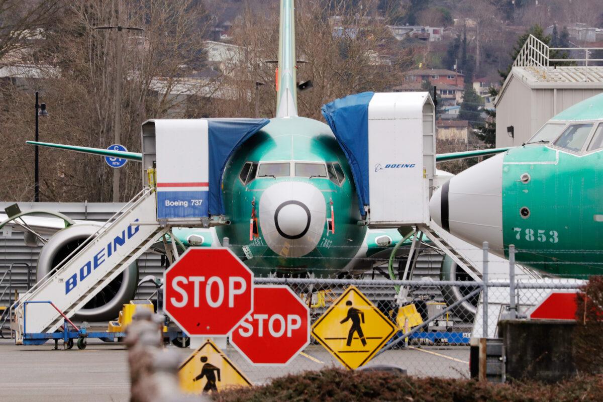 A Boeing 737 Max jets sit parked in Renton, Wash., Dec. 16, 2019. (Elaine Thompson/AP Photo)