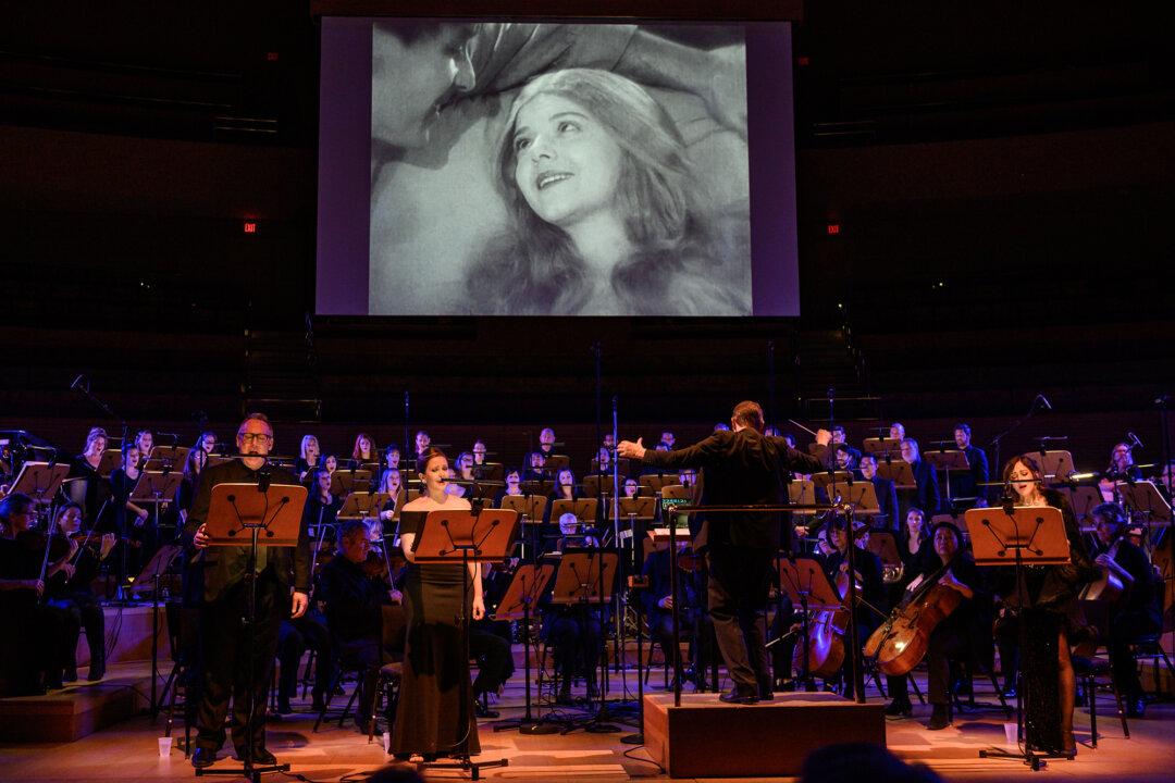 Settling an Old Score: A Song of Two Humans