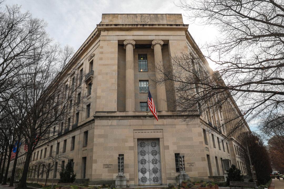 CCP Agent Conspired With New York Police Officer to Spy on Americans: DOJ