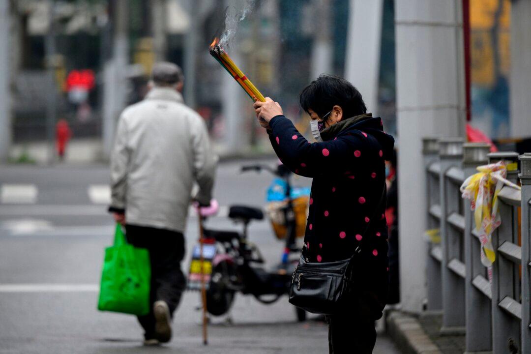 Chinese Cities Enact More Restrictive Measures to Contain Coronavirus
