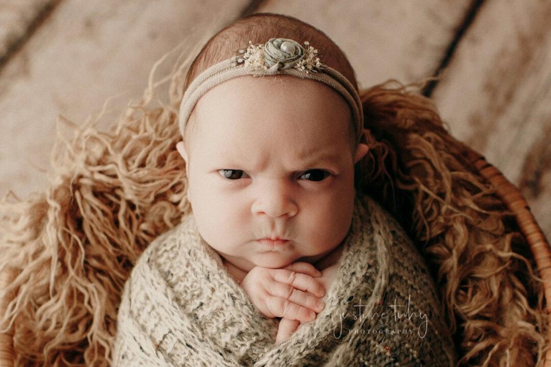 Baby’s Grouchy Facial Expressions During Photoshoot Take Over the Internet, and Her Parents Love It