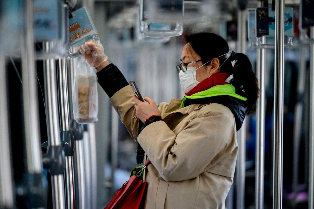 Chinese Officials Confirm Airborne Transmission of Coronavirus in Limited Conditions