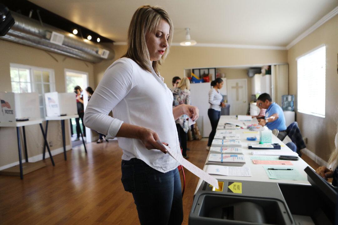 Man Linked to Former Rep. Hill’s Campaign Arrested for Hacking Her Opponent’s Website