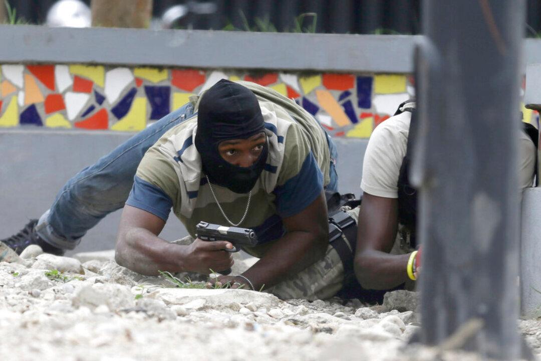 Haiti Police Exchange Fire With Troops Near National Palace