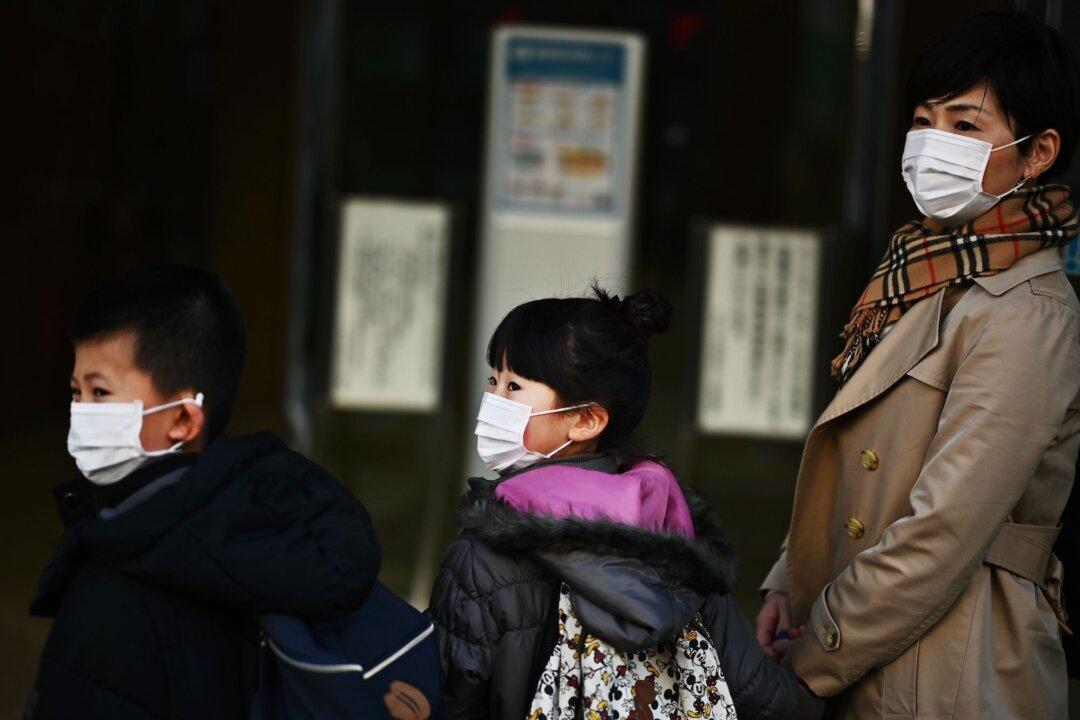 Feds Urge Schools to Address Coronavirus-Fueled Bullying of Asian Students