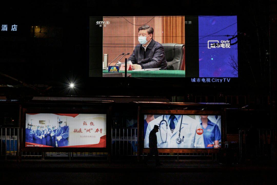 Chinese Regime Puts on Political Show With Xi’s Trip to Coronavirus Epicenter Wuhan