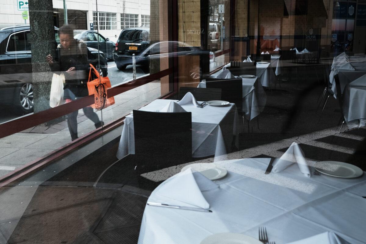 People walk through downtown on March 10, 2020, in New Rochelle, N.Y. (Spencer Platt/Getty Images)