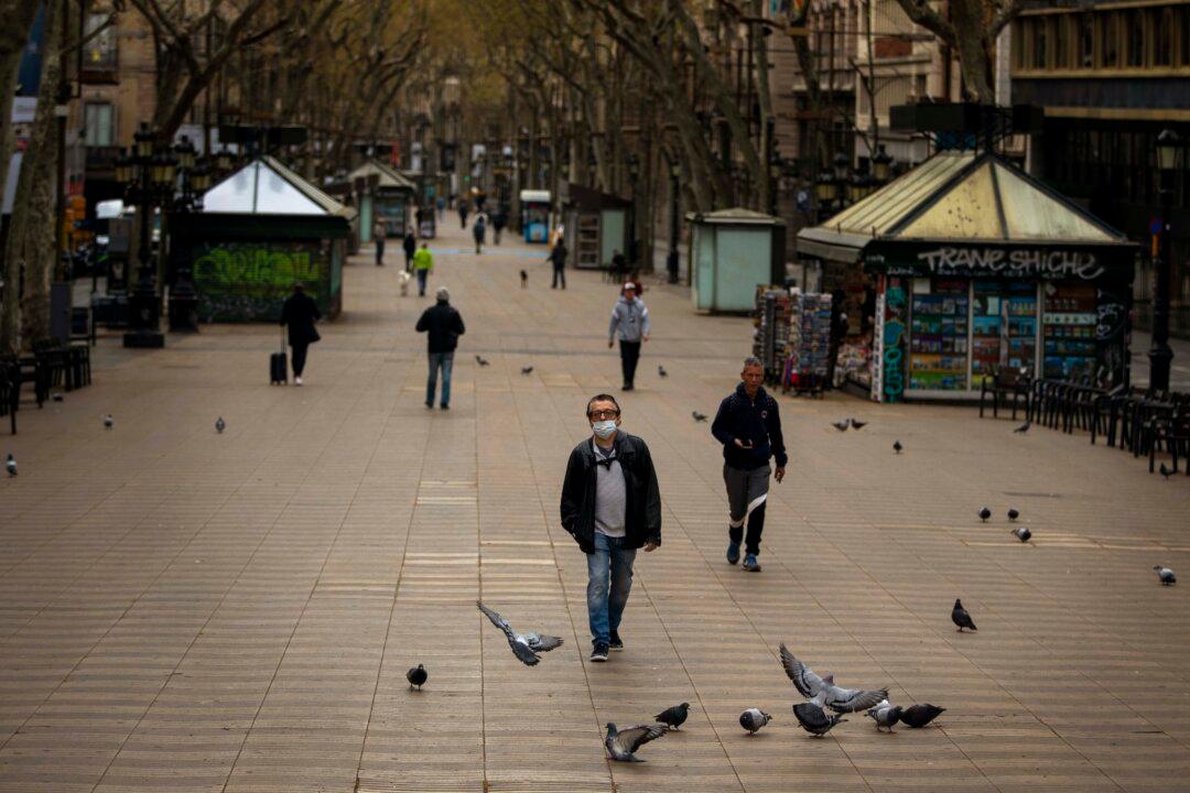 Daily Life Near a Standstill as Nations Try to Halt Pandemic