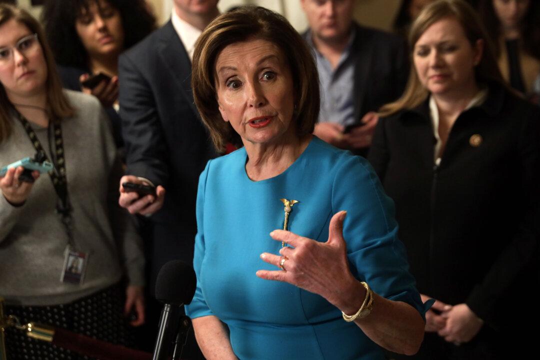 Pelosi Reacts to Virus Stimulus Deal, Declines to Say When House Will Vote