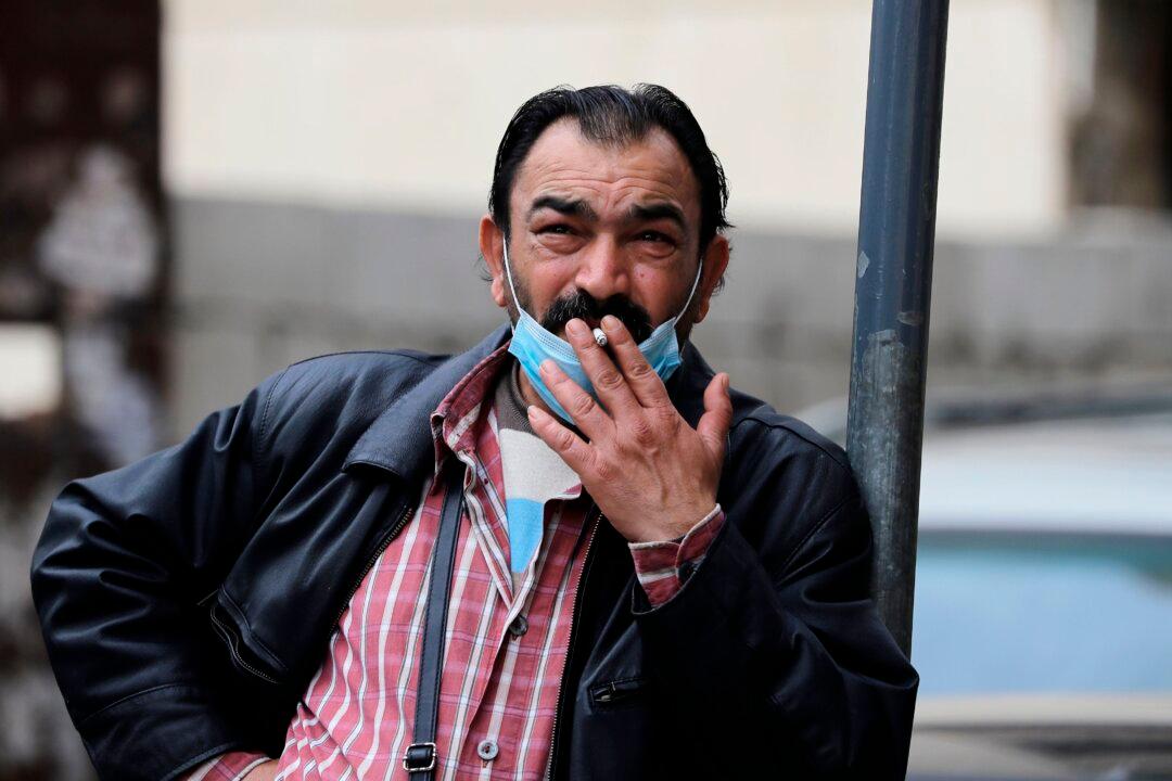 Virus Toll in Iran Climbs as Lockdowns Deepen Across Mideast