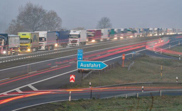 Trucks are jammed in the early morning on Autobahn 12 in front of the German-Polish border crossing near Frankfurt (Oder), Germany, on March 18, 2020. (Patrick Pleul/dpa via AP)