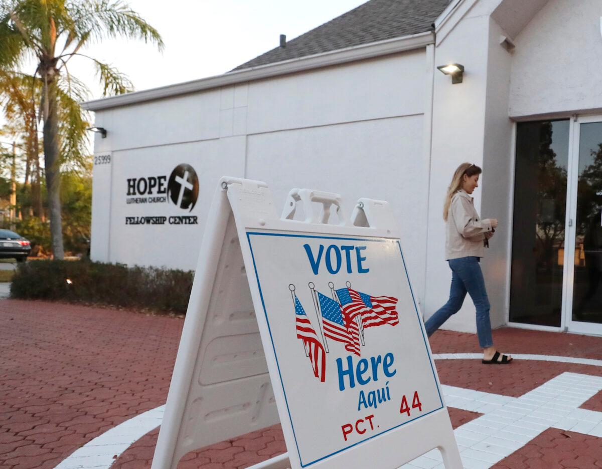 A voter walks into a polling station for the Florida presidential primary, in Bonita Springs, Fla., on March 17, 2020. (Elise Amendola/AP Photo)