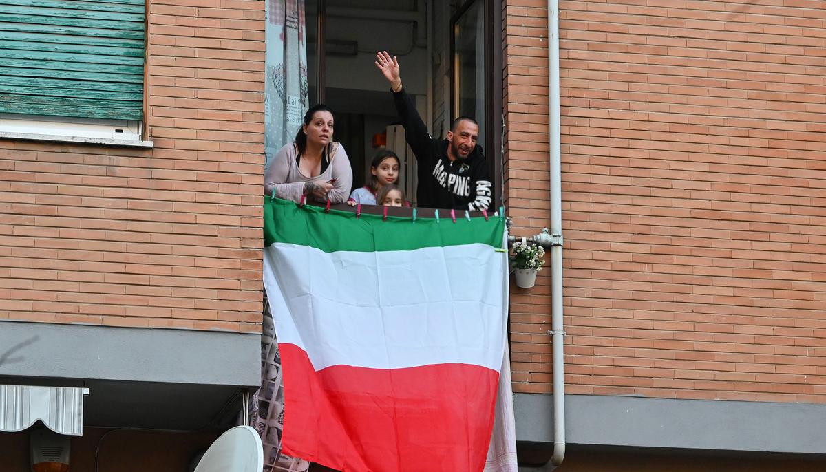Italian Neighbors Lean Out of Their Windows to Sing Together During Coronavirus Lockdown
