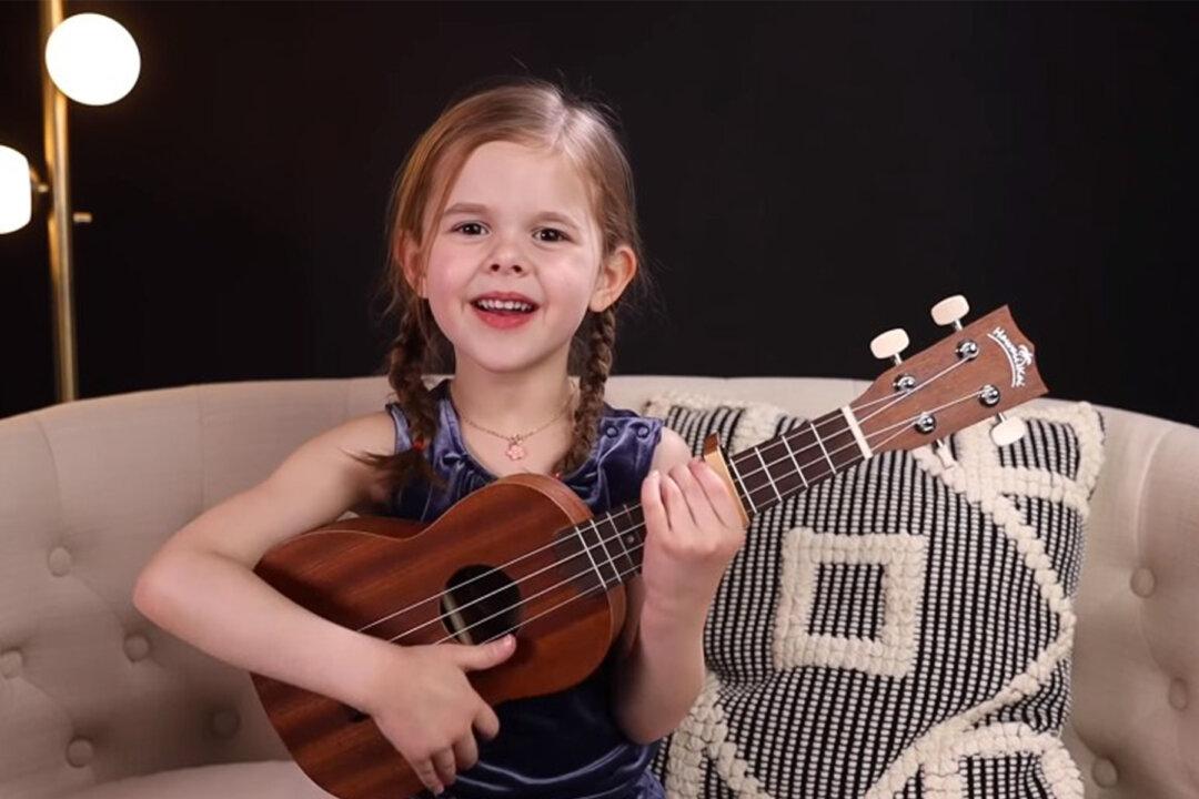 Adorable Little Girl Wins Hearts With Ukulele Cover of Elvis’s Classic (Flashback Video)