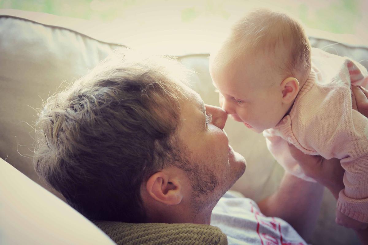 Illustration - Shutterstock | <a href="https://www.shutterstock.com/image-photo/happy-young-father-playing-his-newborn-291906539">Christin Lola</a>