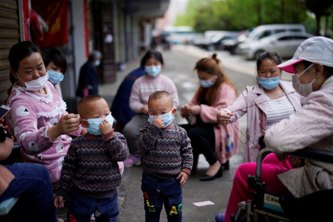 Lockdown Lifted, but Exodus From Chinese City Hindered by New Coronavirus Test Rule
