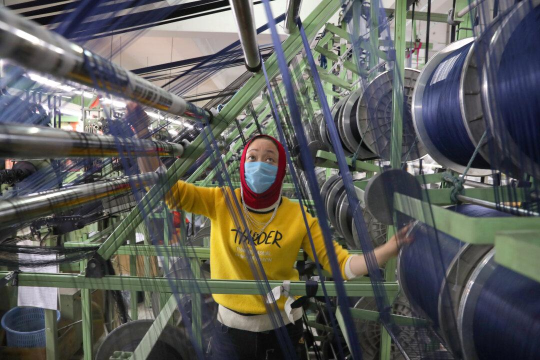 China’s Factories Reopen, Only to Fire Workers as Virus Shreds Global Trade