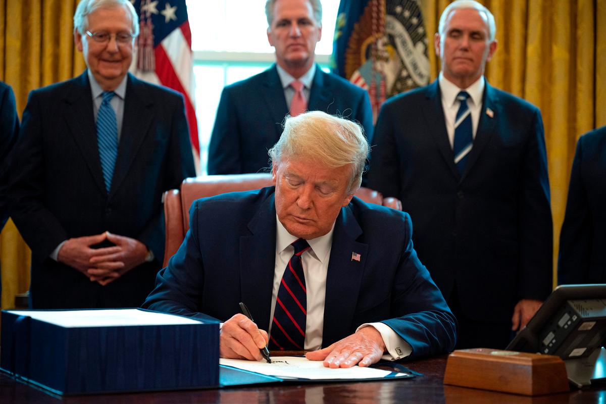 Trump Signs Largest Stimulus Bill in Modern US History