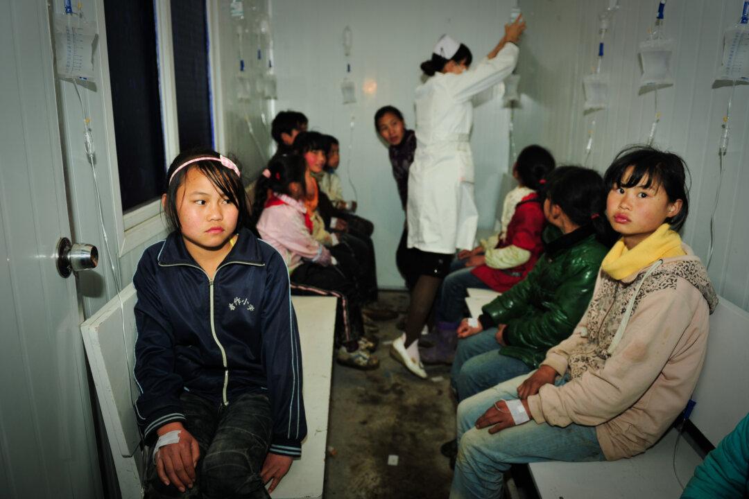 Some Chinese High Schools Reopen, as Public Worries About New Virus Outbreaks