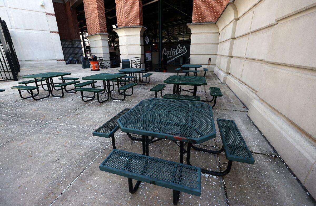 A picnic area inside of Oriole Park at Camden Yards is empty in Baltimore, Md., on March 26, 2020. The Baltimore Orioles and New York Yankees Opening Day game scheduled for today, along with the entire MLB season, has been postponed due to the pandemic. (Rob Carr/Getty Images)
