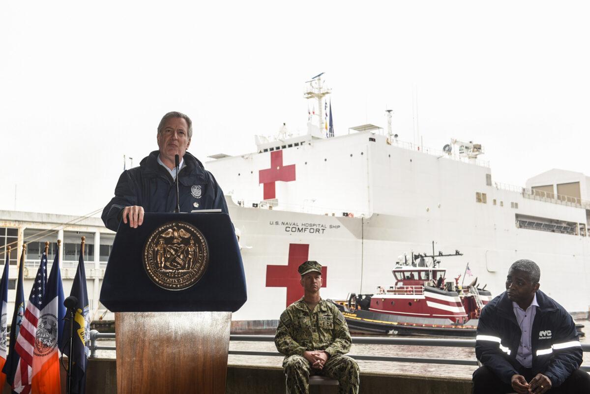 New York City Mayor Bill de Blasio speaks to members of the press after the arrival of the USNS Comfort hospital to Pier 90 on the Hudson River in New York City on March 30, 2020. (Stephanie Keith/Getty Images)