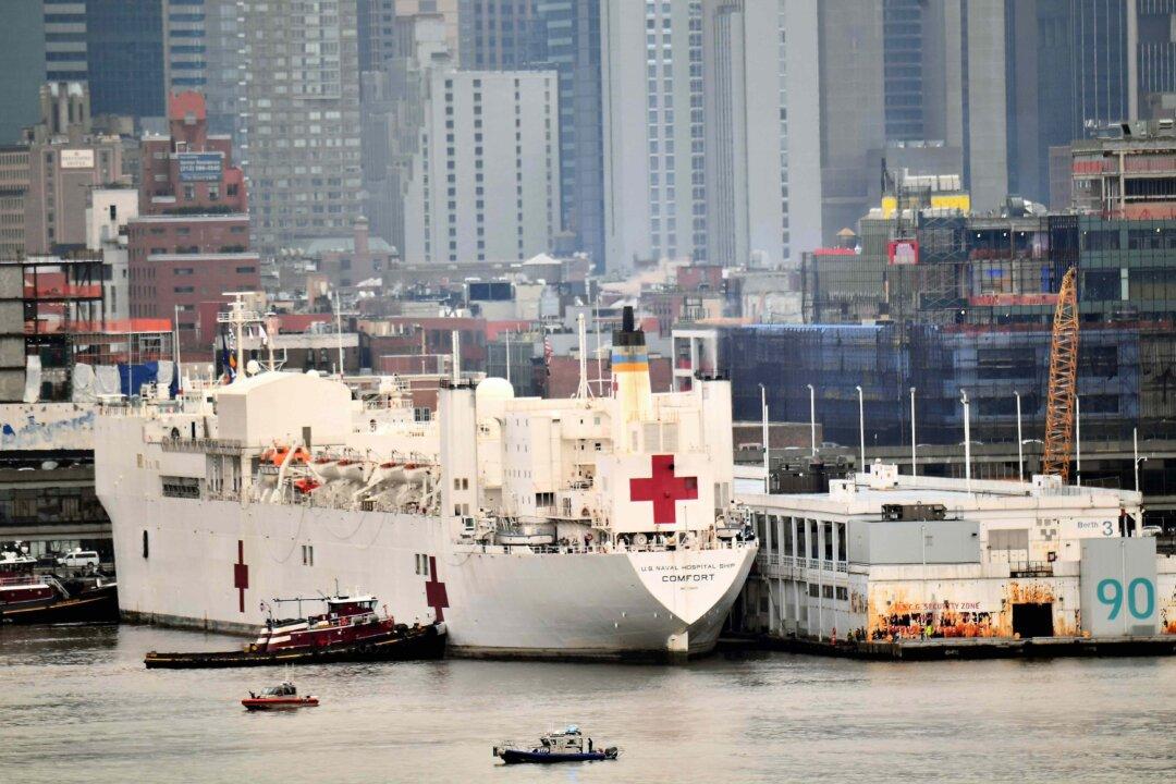 USNS Comfort Crew Member Tests Positive As Ship Begins Taking in Virus Patients
