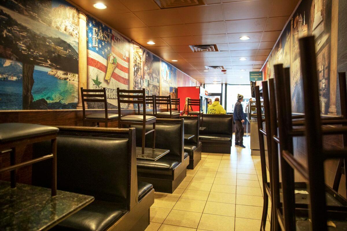 The dining section is closed off at East Side Pockets, a small restaurant in Providence, R.I., on March 25, 2020. (AP Photo/David Goldman)