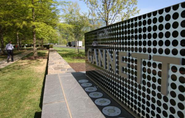 A sign in front of Gannett Co. Inc., headquarters is shown in Tysons Corner, Virginia. (Mark Wilson/Getty Images)