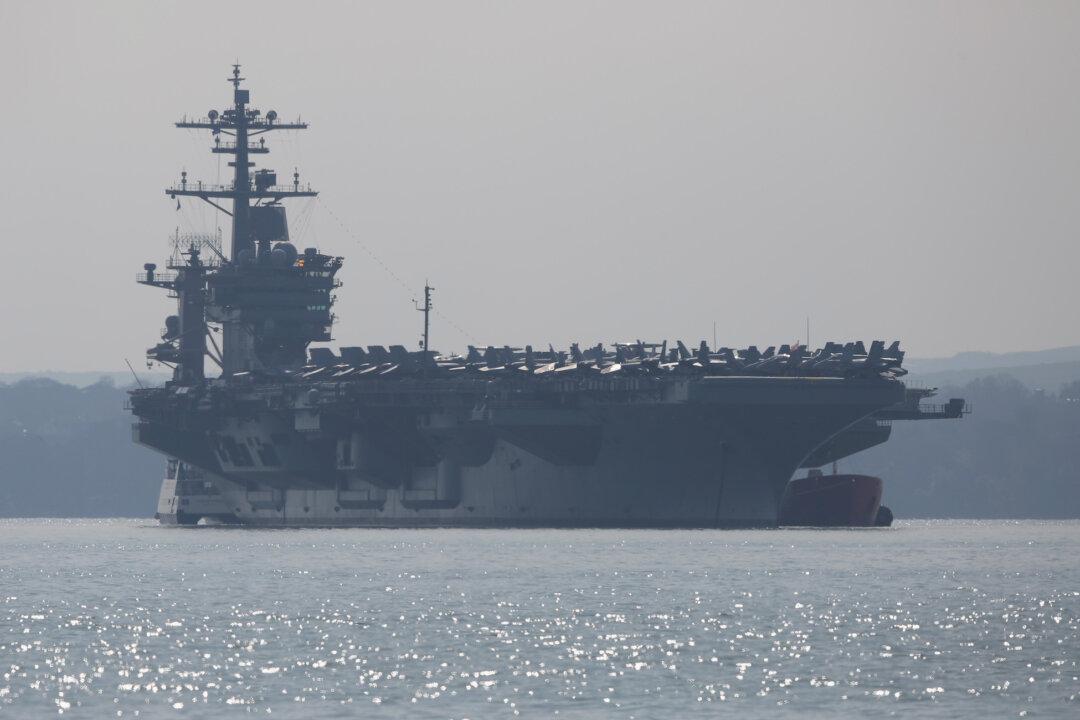 US Navy Evacuating Virus-Hit Aircraft Carrier Docked in Guam