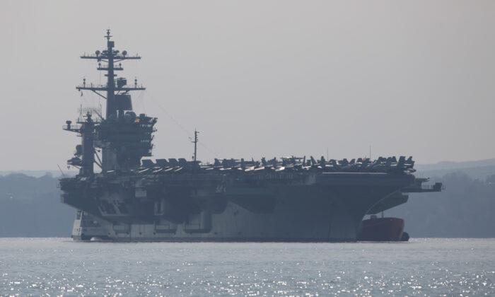 US Navy Evacuating Virus-Hit Aircraft Carrier Docked in Guam