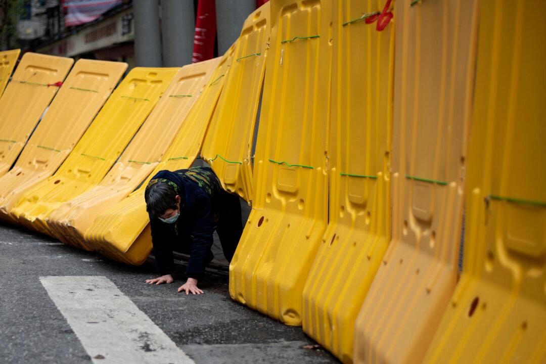 Top Expert at China’s CDC: Epidemic Is Not Over in China