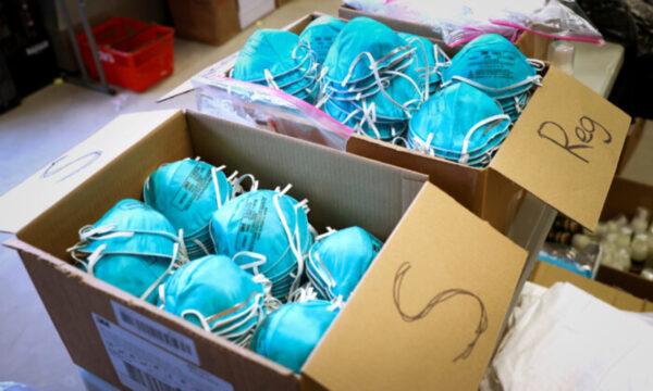 Boxes of N95 protective masks for use by medical field personnel at a New York State emergency operations incident command center during the CCP virus outbreak in New Rochelle, N.Y., on March 17, 2020. (Mike Segar/Reuters)