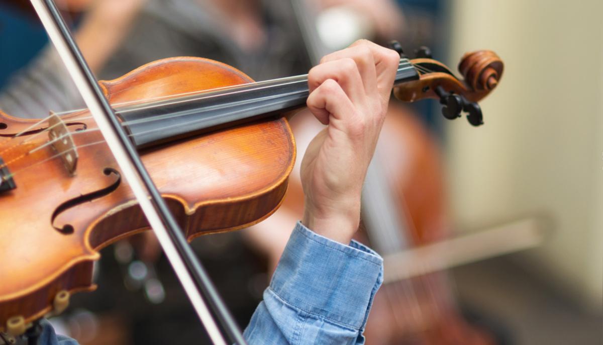 Video Shows Full Orchestra Flash Mob Started by Little Girl Placing a Coin in a Hat