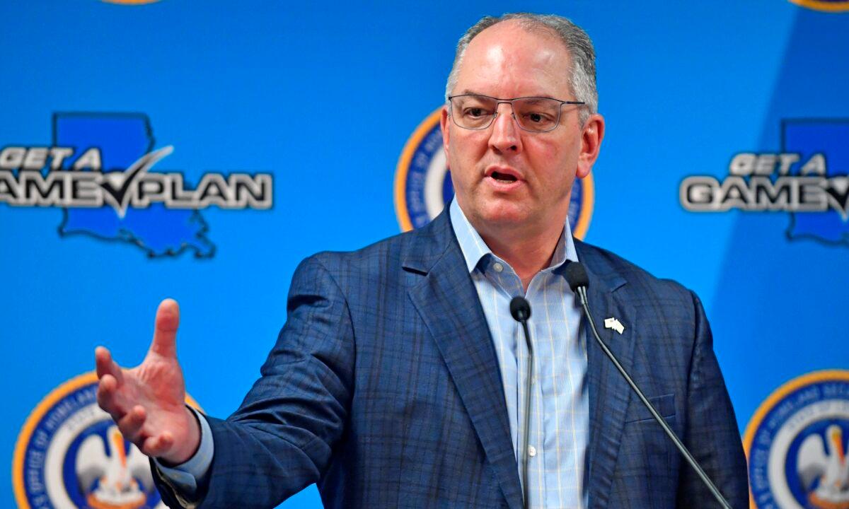 Louisiana Gov. John Bel Edwards gives an update on the spread of CCP virus in the state of La., at GOHSEP in Baton Rouge, La, on April 9, 2020, (Hilary Scheinuk/The Advocate via AP)