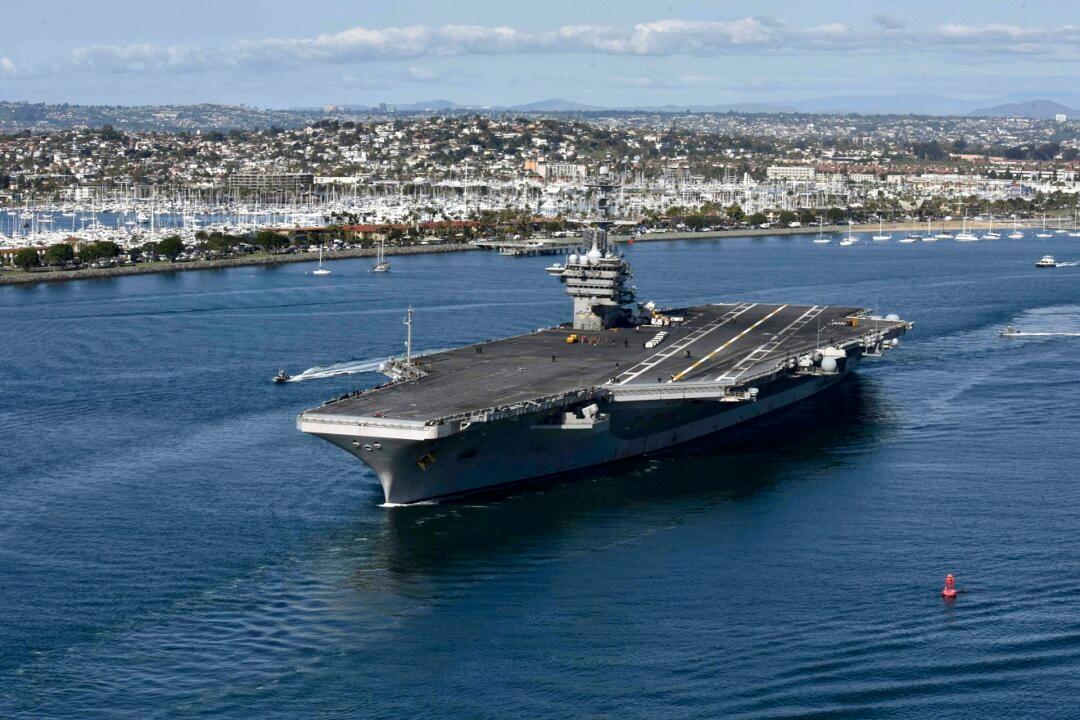 One in 5 Sailors on Virus-Hit Carrier Test Positive in Final Tally