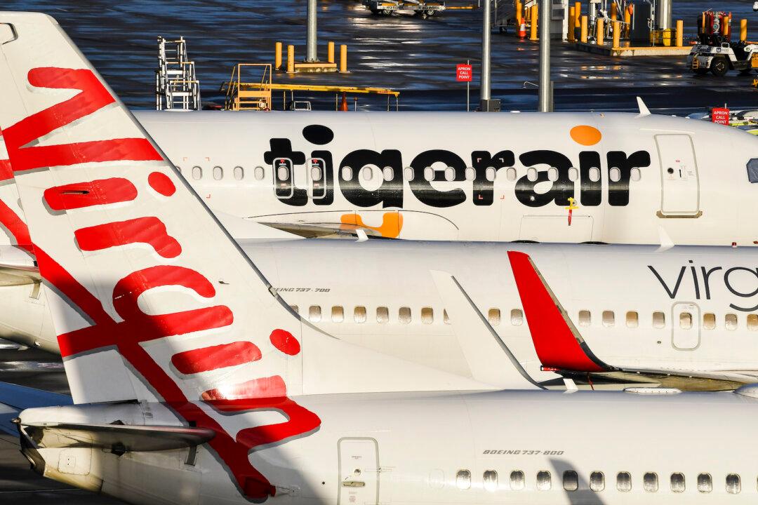 Shareholders Should Bail Out Virgin: Australian Treasurer
