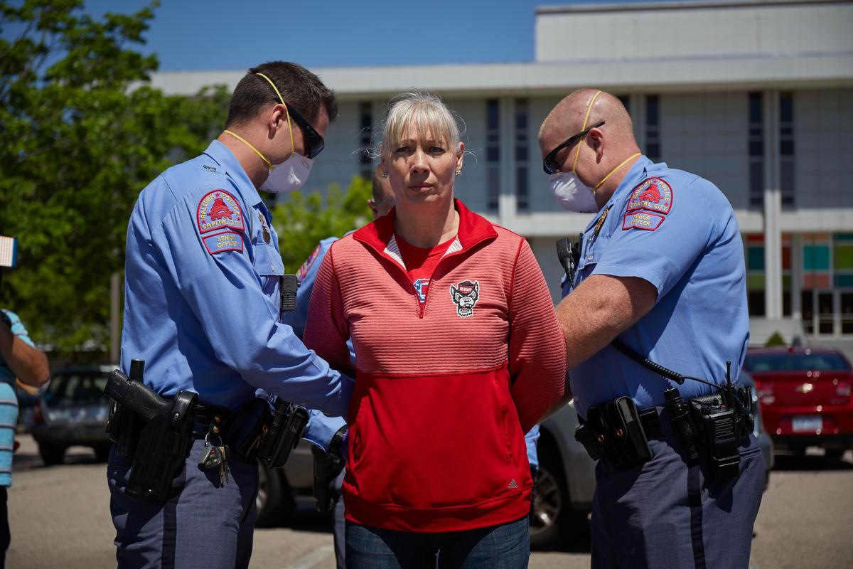 One Arrested As Protesters Rally for North Carolina to Reopen Despite Stay-At-Home Order
