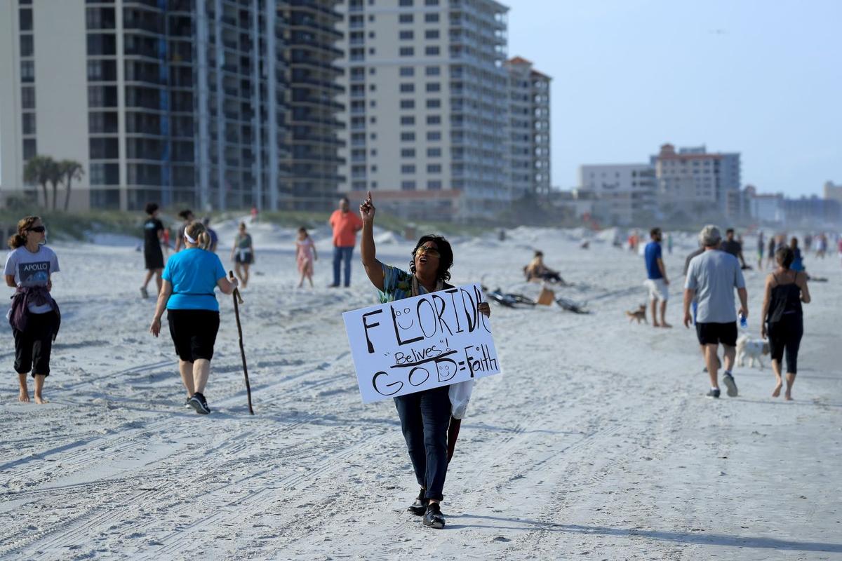 Hundreds of People Flock to Florida Beaches After Reopening