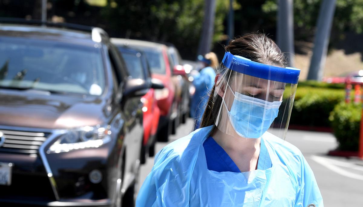Masked Medics Face Off Against Anti-Lockdown Protestors Refusing to Self-Quarantine in Colorado