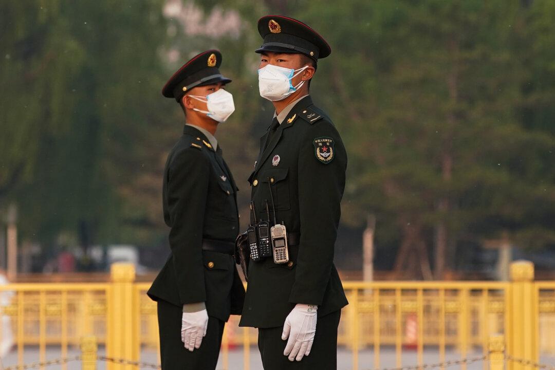 Beijing, on High Alert as Virus Spreads, Monitors Close Contacts of Those Infected
