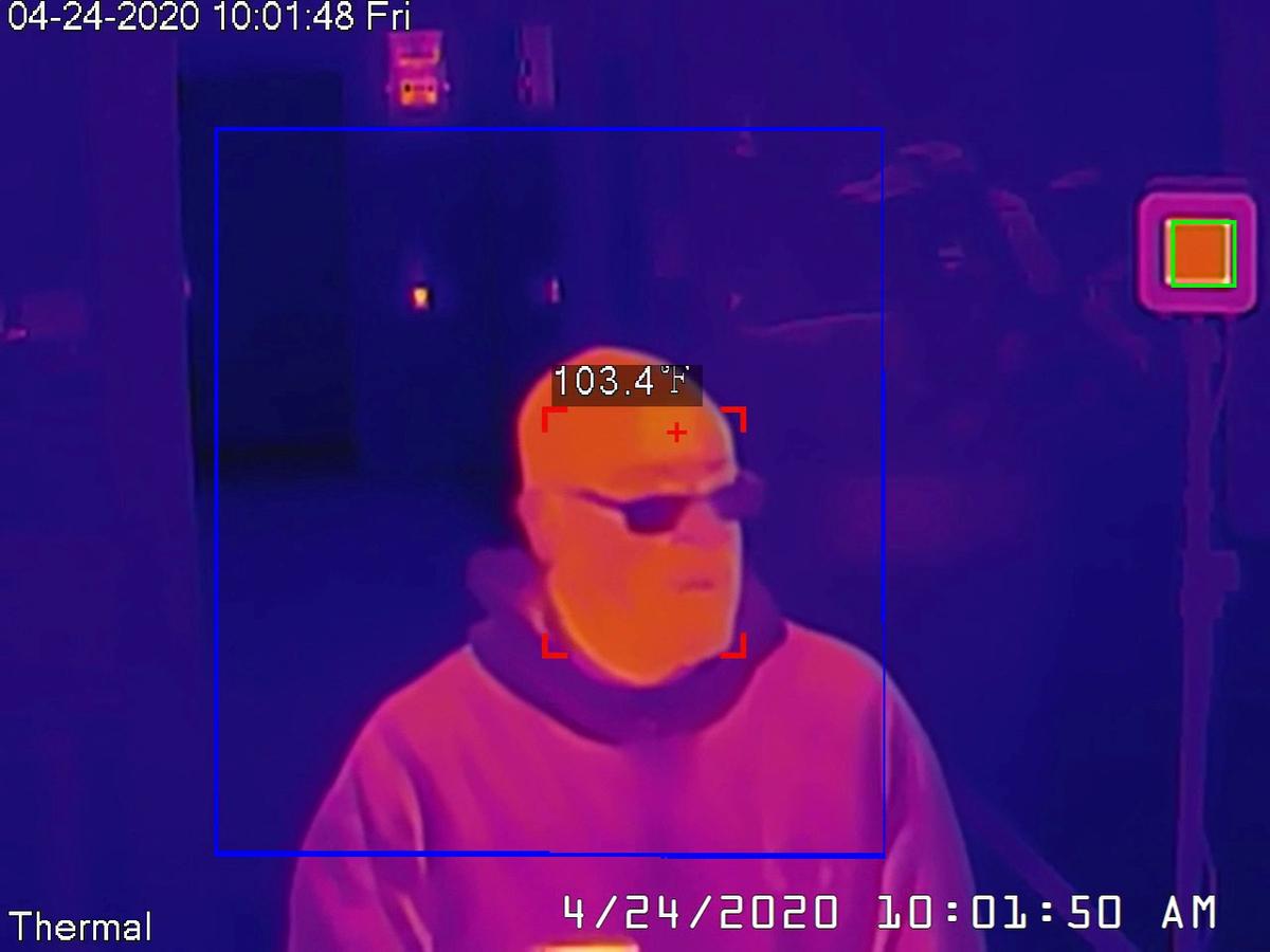 A Dahua thermal camera takes a man's temperature during a demonstration of the technology in San Francisco, Calif., on April 24, 2020. (Lewis Surveillance/Reuters)