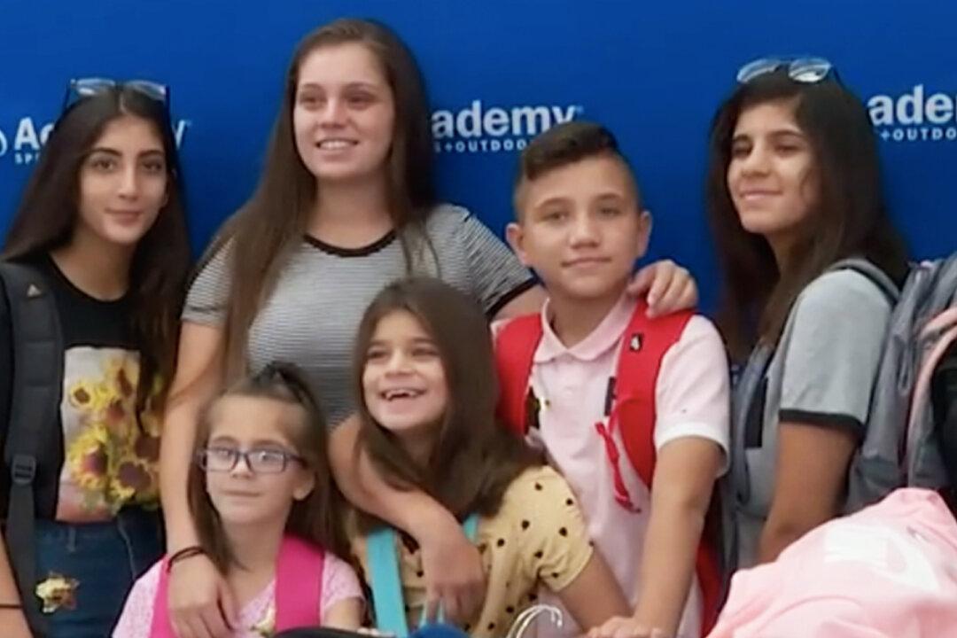 21-Year-Old Becomes a Mom and a Dad to 5 Siblings After Parents Died of Cancer