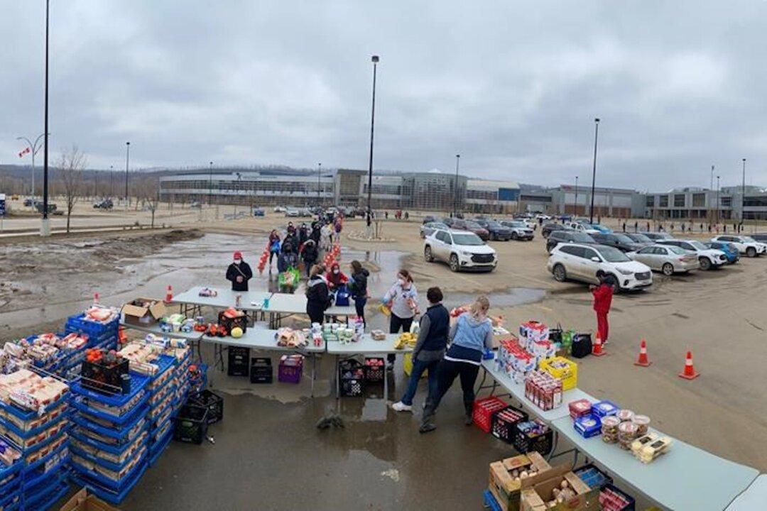 Soaked Walls and Muddy Basements: Fort McMurray Residents Survey Their Flooded Homes