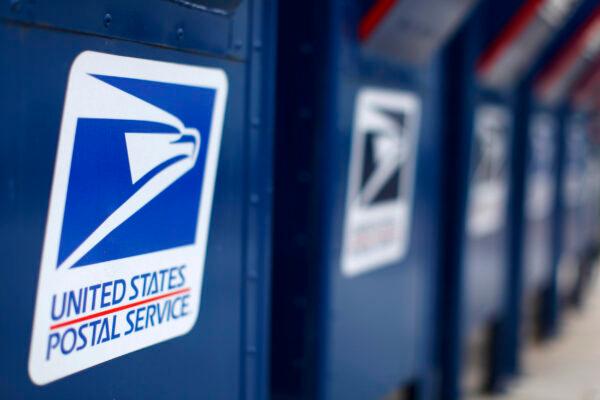 A view shows U.S. postal service mail boxes at a post office in Encinitas, California in a 2013 file photograph. (Mike Blake/Reuters)