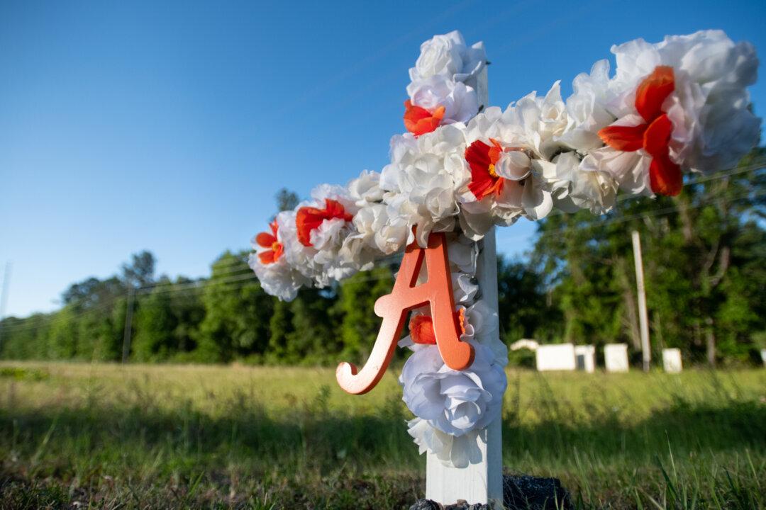 Former Police Officer and Son Charged in Shooting of Ahmaud Arbery